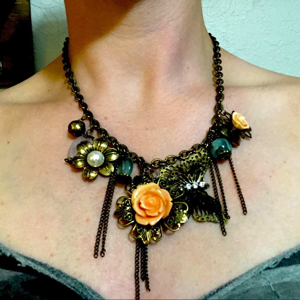 Antique style butterfly and flower necklace
